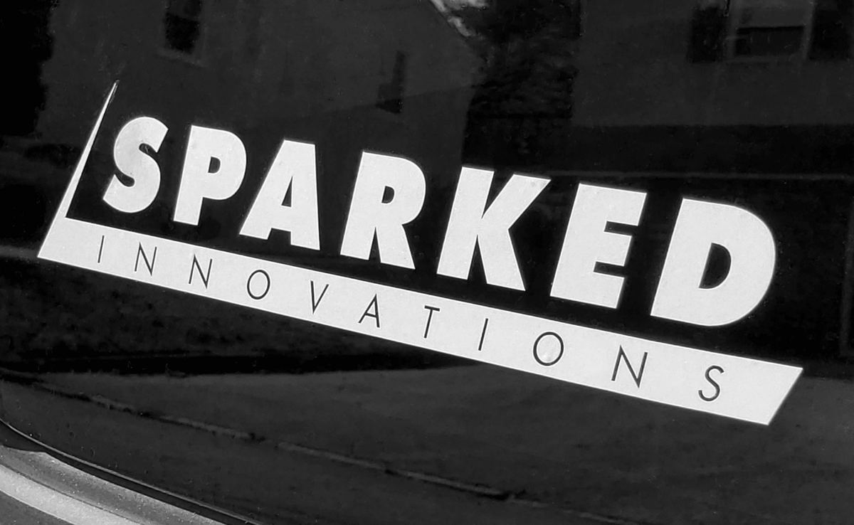 Sparked Innovations white vinyl transfer sticker decal rectangular logo