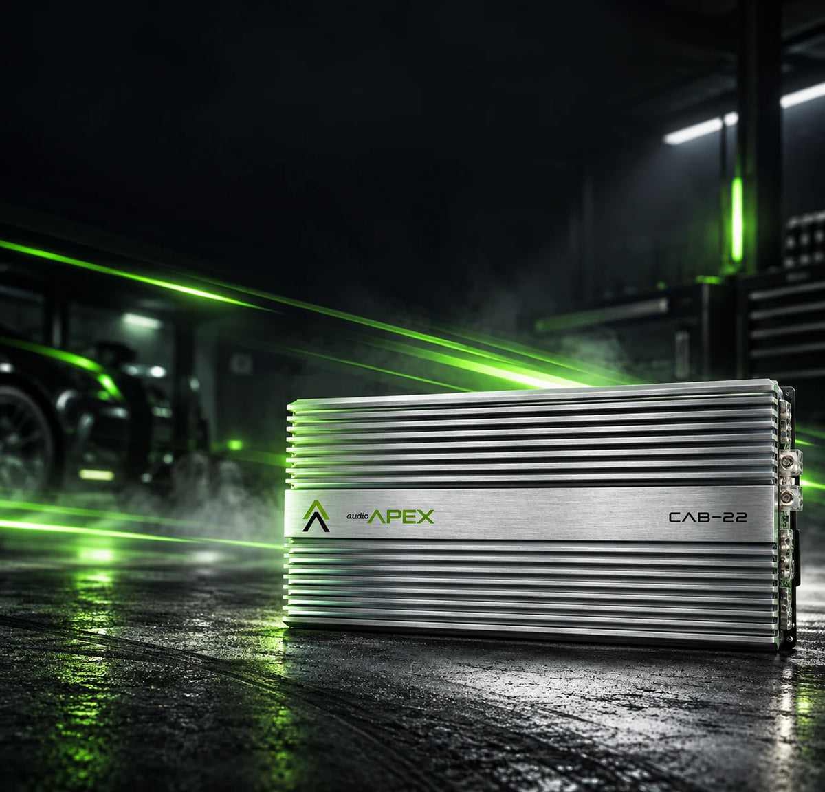 Audio Apex CAB-22 amplifier on a workbench with green shop lighting. Big power, right here. Shop amplifiers.
